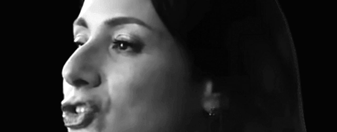 Woman speaking in profile